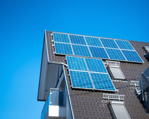 some solar panels on the roof of a private house